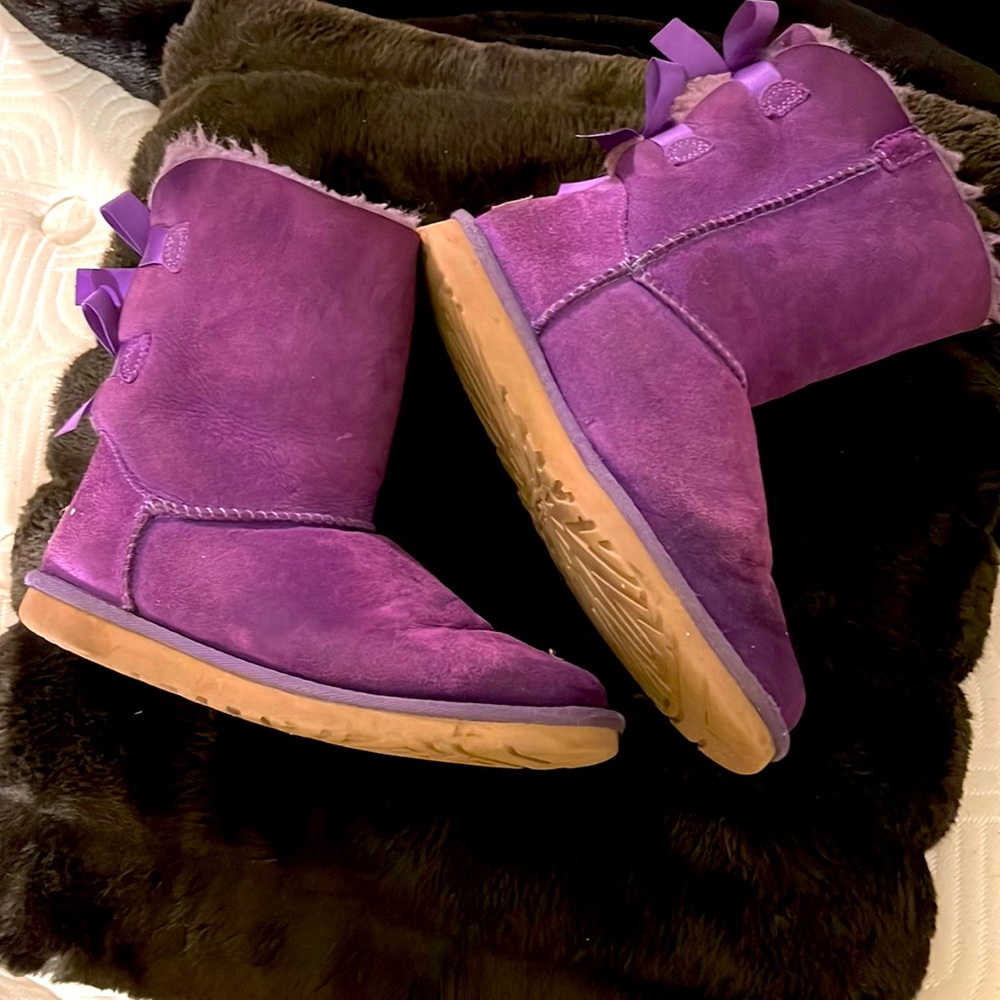Purple Uggs with bows in the back
